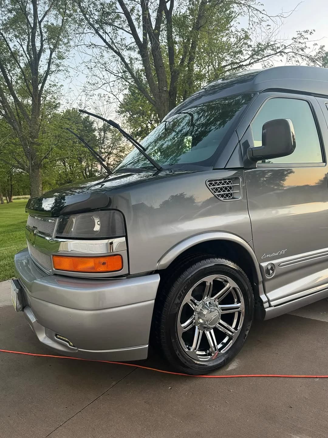 Large gray van after exterior and interior detailing