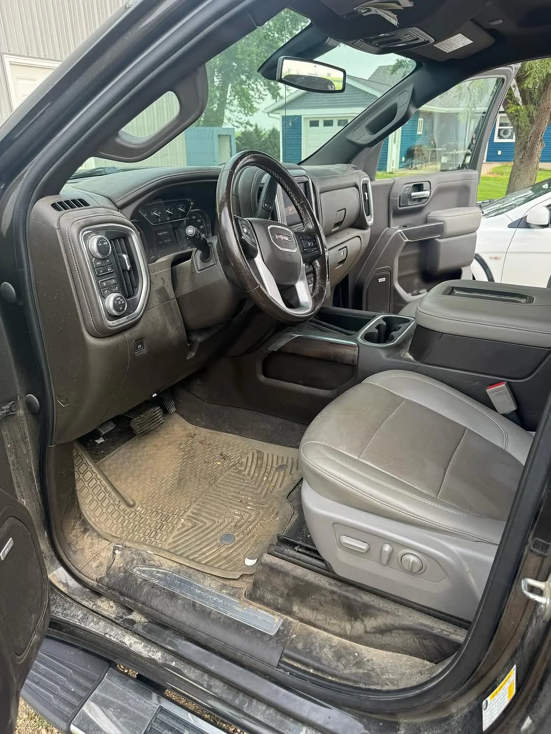 GMC Sierra driver cabin before pet-hair detailing